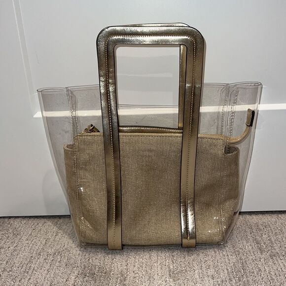 Saks Fifth Avenue Handbags - Saks Fifth Avenue Clear Mini Bag w/ Gold Insert